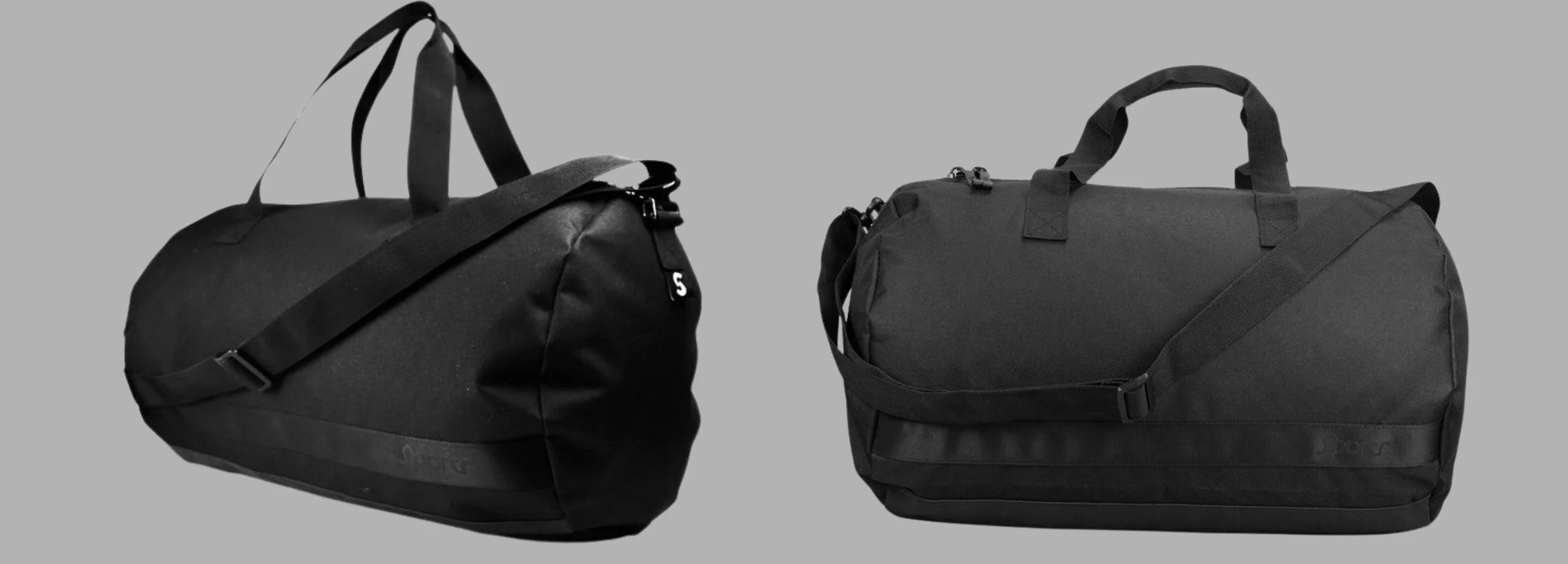 Two black Sportr duffel bags on a gray background